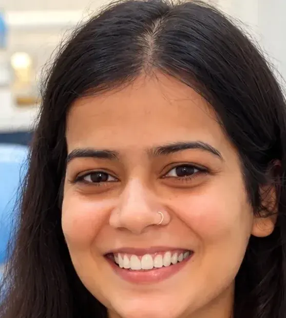 After: the same patient smiling once the braces were removed