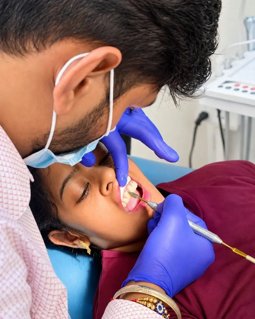 Close view of Dr. Shubham Tripathi examining a patient's front teeth